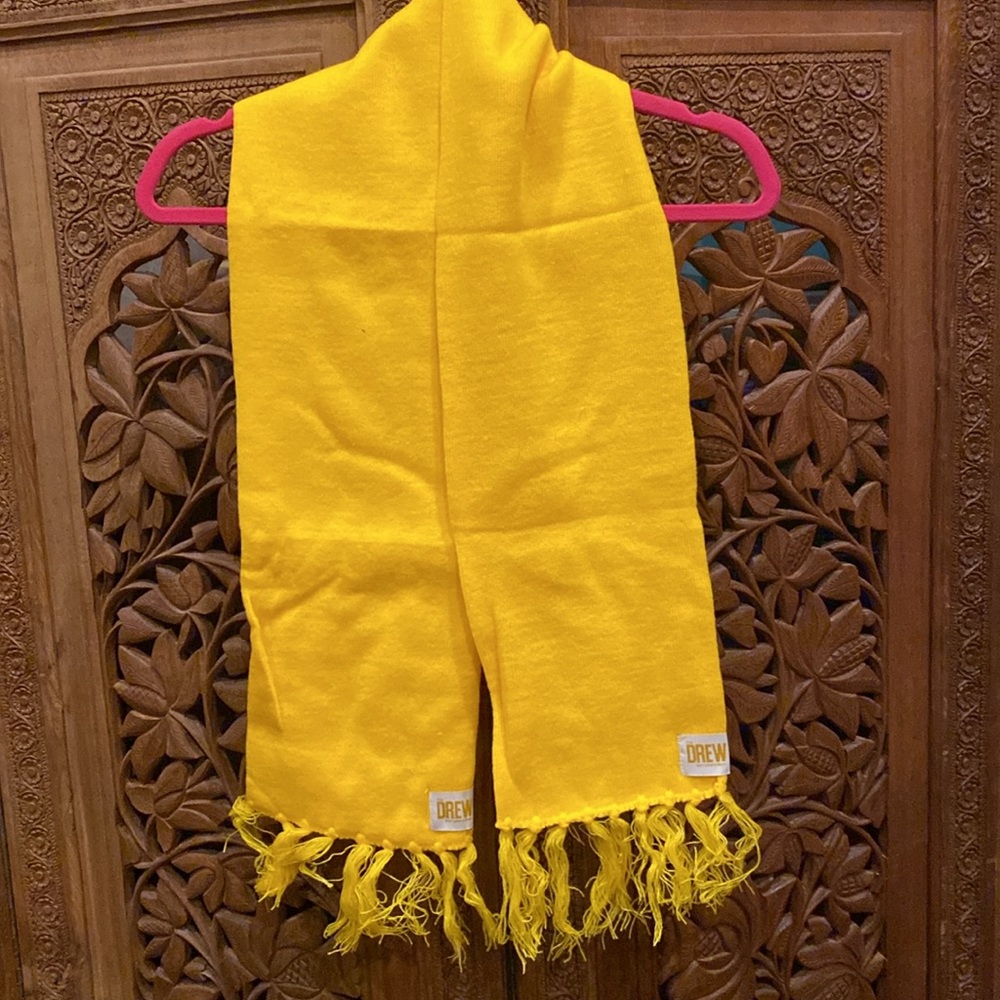 New in package.  Drew Barrymore show souvenir sweater scarf